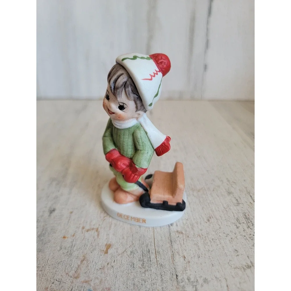 Lefton December month boy sled kid Xmas ceramic home decor figure unique